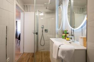 a bathroom with a sink and a shower at Apartment Villa IV in Trogir +74 photos