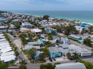 an aerial view of a small town next to the ocean at Playa Esmeralda suite 4 in Bradenton Beach