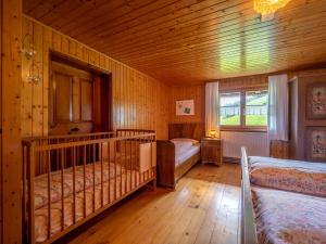 Rúm í herbergi á Ferienhaus Rinderer