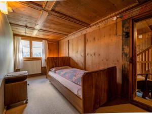 Rúm í herbergi á Ferienhaus Rinderer