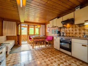 Eldhús eða eldhúskrókur á Ferienhaus Rinderer