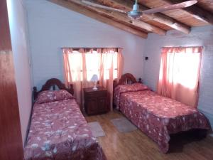 Postel nebo postele na pokoji v ubytování El Paraíso + 29 fotografií