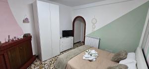 Rúm í herbergi á Cassiopea