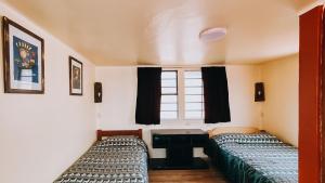 Voodi või voodid majutusasutuse Royal Frankenstein Hostel toas