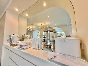 Kuchyň nebo kuchyňský kout v ubytování โรงแรมแรบบิท Rabbit Hotel Nangrong + 25 fotografií