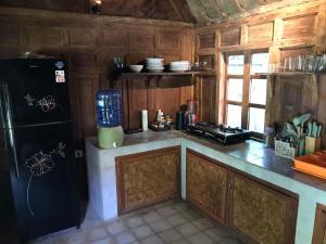 Kuchyň nebo kuchyňský kout v ubytování Room Mari Posa Cottage #4