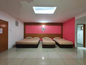 Letto o letti in una camera di Cool Point Hotel