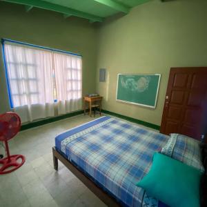 Postel nebo postele na pokoji v ubytování Juan Lindo Hostel