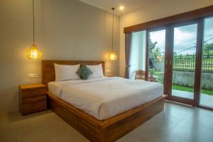 Postel nebo postele na pokoji v ubytování ANYA Guest House