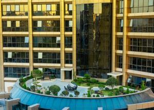 Piscina de la sau aproape de Echarm International Hotel Guangzhou Baiyun International Airport Qingbu Metro Station Branch - Free Deliver Service to Guangzhou Baiyun International Airport & Free Deliver Service to Canton Fair Complex During Canton Fair Period