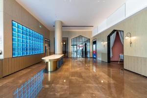Fotografie z fotogalerie ubytování Echarm International Hotel Guangzhou Baiyun International Airport Qingbu Metro Branch - Free Deliver Service to Guangzhou Baiyun International Airport & Free Deliver Service to Canton Fair Complex During Canton Fair Period v Kantonu