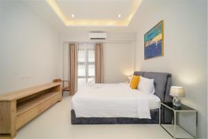 Ένα ή περισσότερα κρεβάτια σε δωμάτιο στο Stay Pool Villa