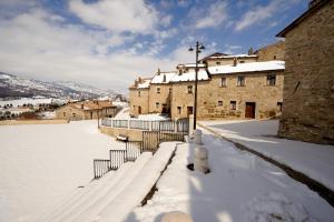 Borgotufi Albergo Diffuso durante o inverno