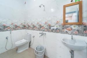 Koupelna v ubytování Sam Residency