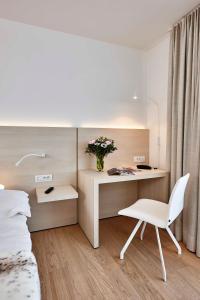 Ένα ή περισσότερα κρεβάτια σε δωμάτιο στο Parkhotel Izegem