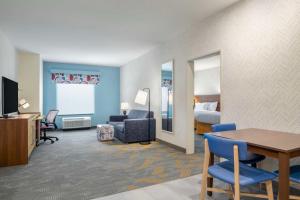 Home2 Suites By Hilton Jonesboro客房内的一张或多张床位