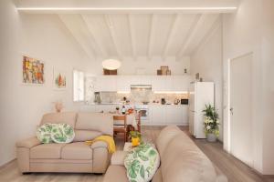 Kuchyň nebo kuchyňský kout v ubytování White Apartment In Marciaga Di Costermano + 12 fotografií