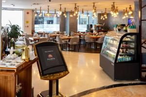 ห้องอาหารหรือที่รับประทานอาหารของ Palm Inn Hotel Doha