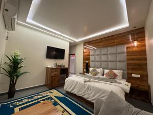 Postel nebo postele na pokoji v ubytování Hotel RedBee