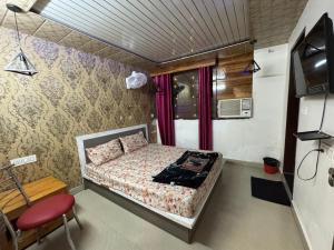 TV a/nebo společenská místnost v ubytování Hotel RedBee