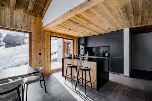 Kuchyň nebo kuchyňský kout v ubytování Chalet Prestige Valmorel