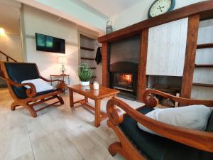 Posezení v ubytování Gîte confortable avec SPA privé et confort moderne