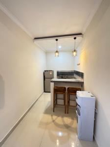Η κουζίνα ή μικρή κουζίνα στο Adi Kerta Ubud