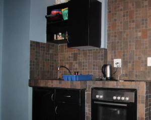 Kuchyň nebo kuchyňský kout v ubytování 50 stiemens street , braamfontein , 2050