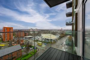 a view of a city from a window of a building at Modern Luxurious Central Apartment in Manchester