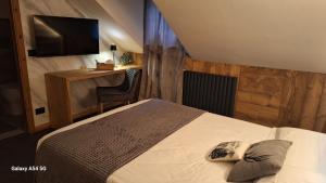 Postel nebo postele na pokoji v ubytování Hotel Valle Pesio Ristorante