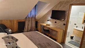 Postel nebo postele na pokoji v ubytování Hotel Valle Pesio Ristorante