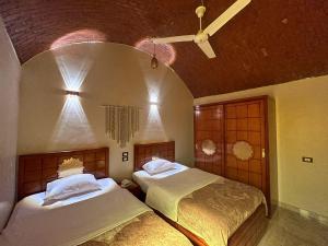 Postel nebo postele na pokoji v ubytování Nubian Soul Guest Houses