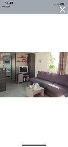 Et opholdsområde på Mobilhome 6 et 4 places terrasses couvertes - Les Dunes de Contis