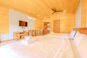 Кровать или кровати в номере The O2H Agonda Beach Resort