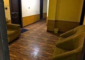 Posezení v ubytování New Islamabad Hotel