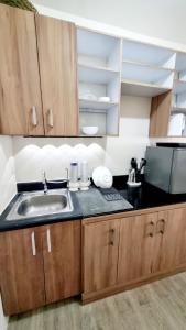 Η κουζίνα ή μικρή κουζίνα στο Joms Minimalist Crib Nuvali +12 φωτογραφίες