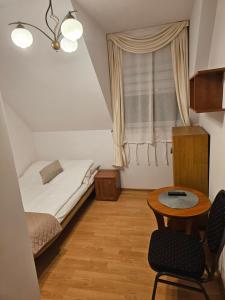 Postel nebo postele na pokoji v ubytování Noclegi Węgierska Górka
