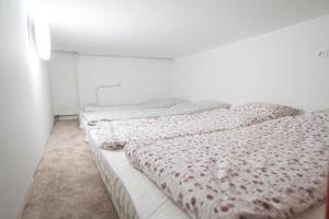 Posteľ alebo postele v izbe v ubytovaní Elisabeth Bridge Apartmans