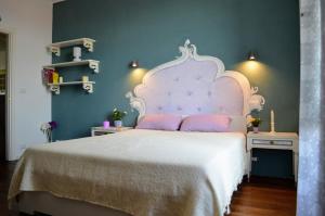 Postel nebo postele na pokoji v ubytování Lullaby Holiday