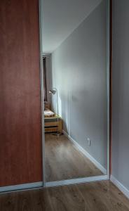 Postel nebo postele na pokoji v ubytování Velvet Łucka