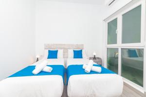 Postel nebo postele na pokoji v ubytování Moreno Rooms