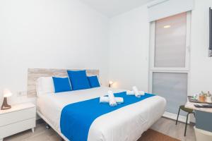 Postel nebo postele na pokoji v ubytování Moreno Rooms