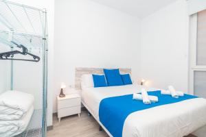 Postel nebo postele na pokoji v ubytování Moreno Rooms