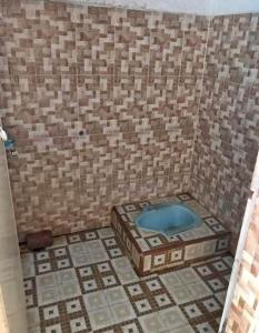 Кровать или кровати в номере Vila Marelan Gang Abadi