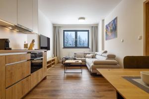 Kuchyň nebo kuchyňský kout v ubytování Luční apartmán Jurajda