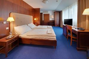 Giường trong phòng chung tại Hotel Torysa