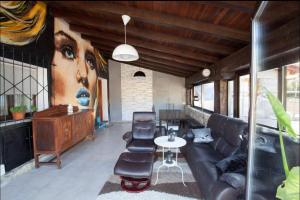 a living room with a couch and a table at Aberasturi in Gautegiz Arteaga