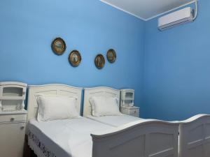 Rúm í herbergi á Apartmani Dragulj