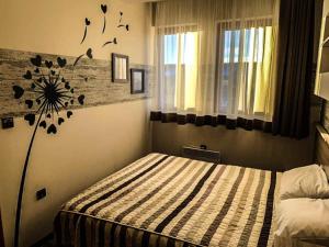 Ένα ή περισσότερα κρεβάτια σε δωμάτιο στο Apartment Bellevue E7