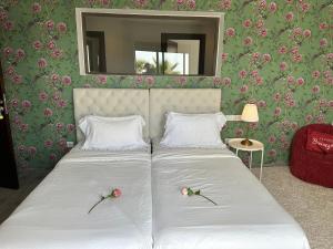 Postel nebo postele na pokoji v ubytování Villa 96 Résidence Amda Taghazout Bay + 27 fotografií